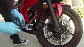 HOW TOREPLACING FRONT BREAKS ON NINJA 650 [upl. by Eilhsa96]