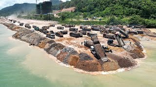 Huge Land Reclamation Process Dump Truck Management Unloading Rock Dirt Bulldozer Pushing Stone [upl. by Sandon]