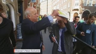 UKIPs Godfrey Bloom hits reporter Michael Crick with party brochure [upl. by Animas]