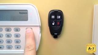 A1 Security Alarms Inc DSC How to use 4 Button Keyfob [upl. by Eltsirk]