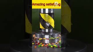 Crushing candy with 100 ton Hydraulic Presshydraulicpresscrushingsatisfyingviralcandy [upl. by Ennahgem]