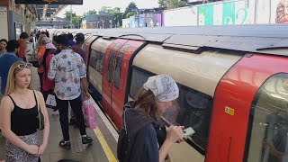 Neasden Station Jubilee and Metropolitan Line London Underground tube trains [upl. by Eirrehc288]