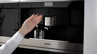 Miele Italia  Macchine per il caffè Nespresso Generazione 6000 Tecnologia ComfortDoor [upl. by Knudson31]