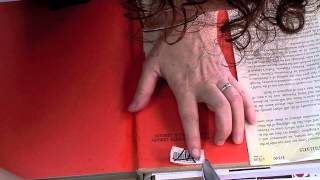 Remove a Library Barcode Sticker with a Book Repair Knife [upl. by Ecinerev]