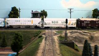 A SOO grain train clatters across the diamonds near LaSalle EMRRC [upl. by Kant160]