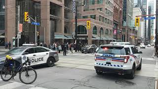 Toronto police ambulance escort shuts down Yonge St in Toronto after shooting [upl. by Esineg]