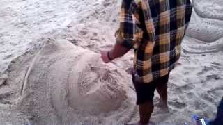 How To Create Sand Sculpture  Orissa Tourism HD Video [upl. by Lucrece]