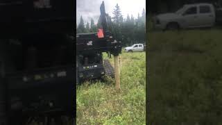 Skid Steer Driving Wood Post 4 Feet in 10 Seconds  Vibe Drive TimberWolf vibrating post driver [upl. by Ezara657]