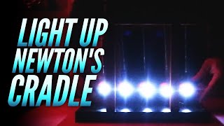 Giant Light Up Newtons Cradle Tricks [upl. by Noffets]