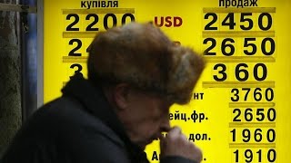 Ucraina crolla il cambio Lincubo dei prestiti in dollari  economy [upl. by Macleod776]