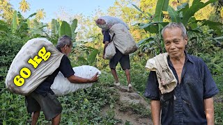 Its very sad this 70 year old grandfather works as a 60 kg load carrier on a steep road [upl. by Annawit43]