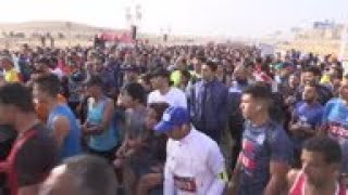 Thousands run a marathon through Egypts pyramids [upl. by Ocirrej]