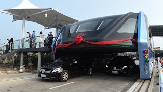 Awesome Chinas futuristic quotstraddling busquot launches 1st road test [upl. by Nesyaj]