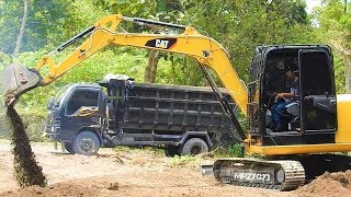 Mini Excavator Loading Dump Truck CAT 3055E2 [upl. by Ethbin310]