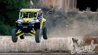 Construction Site Jumps in a RZR SidebySide UTV w Tanner Foust  Donut Media [upl. by Alan523]