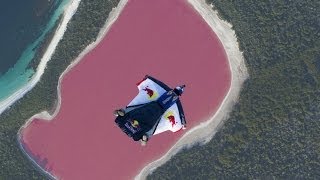 Wingsuit flying over a pink lake in Australia [upl. by Ecnirp]