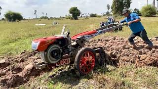 ជួរដីស្រែខ្សាច់Tractor Kubota M6040 SU  FarmerTractor Khmer 2 1 [upl. by Yenettirb]