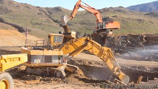 CAT 5130B excavating virgin rock for new roadway slot [upl. by Eicirtap]