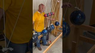 Newton’s Cradle made of bowling balls demonstrates laws of motion physics science [upl. by Usanis]