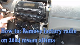 How to Remove factory radio on 2004 nissan altima [upl. by Ahsinrad927]