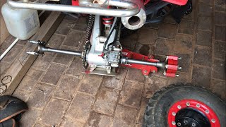 TRX450ER rear axle removal [upl. by Gayla801]