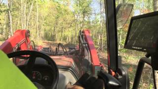 Kioti NX Series Tractor with a Wicked Root Grapple Working [upl. by Chariot4]