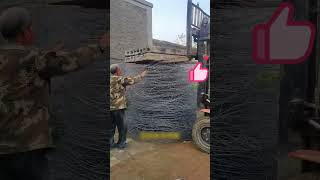 The process of compressing steel wire with the cement board on a forklift [upl. by Kind6]