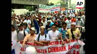 Hundreds of Muslim protesters burn Danish flag at demo [upl. by Buke]