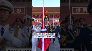 China holds flagraising ceremony on National Day [upl. by Eniamurt]