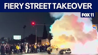 Multiple cars set on fire in street takeovers across LA [upl. by Godden401]