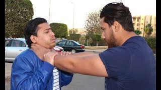 دافع عن نفسك ضد حركة الخنق الأمامي من شخص ضخم اليدين مشدودة Self Defense Aginst Stright Chock [upl. by Hitchcock911]