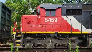 IC 6250 CN 5459 moving an Eastbound local freight train with hoppers through Vicksburg MI [upl. by Nivre]