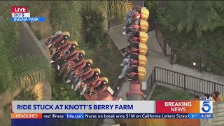 Live coverage Riders stranded in midair after ride malfunctions at Knotts Berry Farm [upl. by Enida]