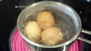 Boiling Three Eggs using an electric cooker [upl. by Ahsatan418]