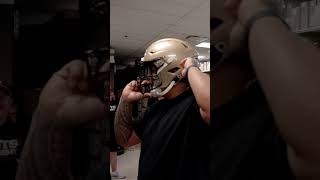 Taliese Fuaga tries Saints helmet on for size saints nfl shorts [upl. by Nilra]