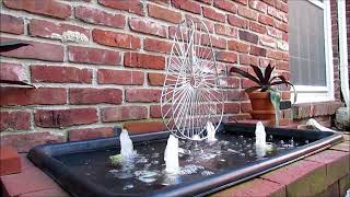 Silver Sculpture With Bubblers Fountain [upl. by Delainey]