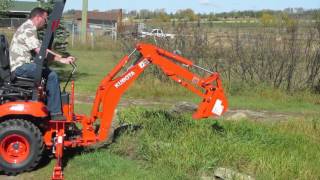 Kubota BX25D  First Time Trying the Backhoe [upl. by Helbonna]