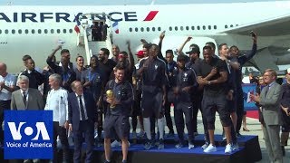 World Cupwinning French team returns home [upl. by Ecidnac]