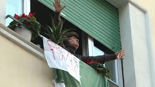 Coronavirus Italians sing under lockdown  AFP [upl. by Welcy]