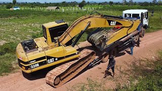 Unbelievable 22Ton 320D CAT Excavator Stuck in Mud Successfully rescue 22T CAT excavator stuck [upl. by Osei]