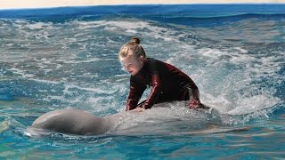 Girl riding beluga whale [upl. by Chesnut]