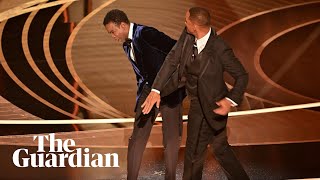 Watch the uncensored moment Will Smith smacks Chris Rock on stage at the Oscars drops Fbomb [upl. by Gabriello967]