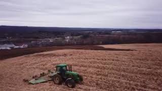 John Deere 4450 Bush hogging stalks CX20 [upl. by Ellswerth]