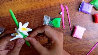 How to make tuberose flower with clay flower making videos with polymer clay for kids [upl. by Ahsilek724]