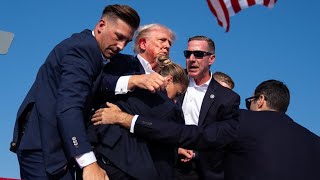 Trump shot at appears to be bleeding and rushed off stage at Pennsylvania rally [upl. by Tanhya100]