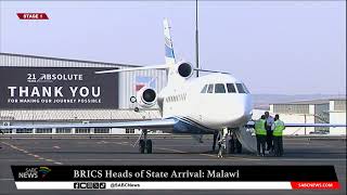 BRICS Summit I Malawian President Lazarus Chakwera arrives in SA [upl. by Cherilyn41]