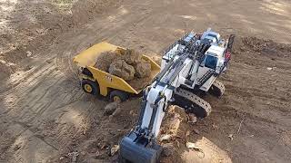 rc Liebherr R 9800 and CAT 793D loading large rocks [upl. by Annahavas]