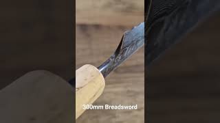 Fredrik Spåre 300mm Damascus Breadsword Getting that bread like a boss [upl. by Evangelin553]