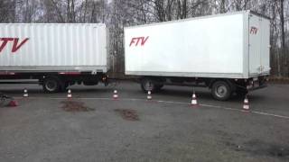 LKW Fahrschule Grundfahraufgabe Gliederzug rückwärts um Kurve schieben [upl. by Ateekahs201]