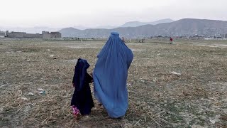 Taliban order Afghan women to cover faces again [upl. by Auqinot]